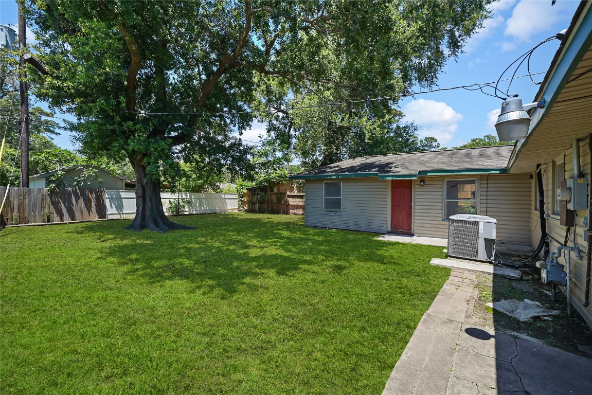 8527 Brower Street Houston, TX 77017 - Photo 17 of 19 a front view of house with a garden and patio