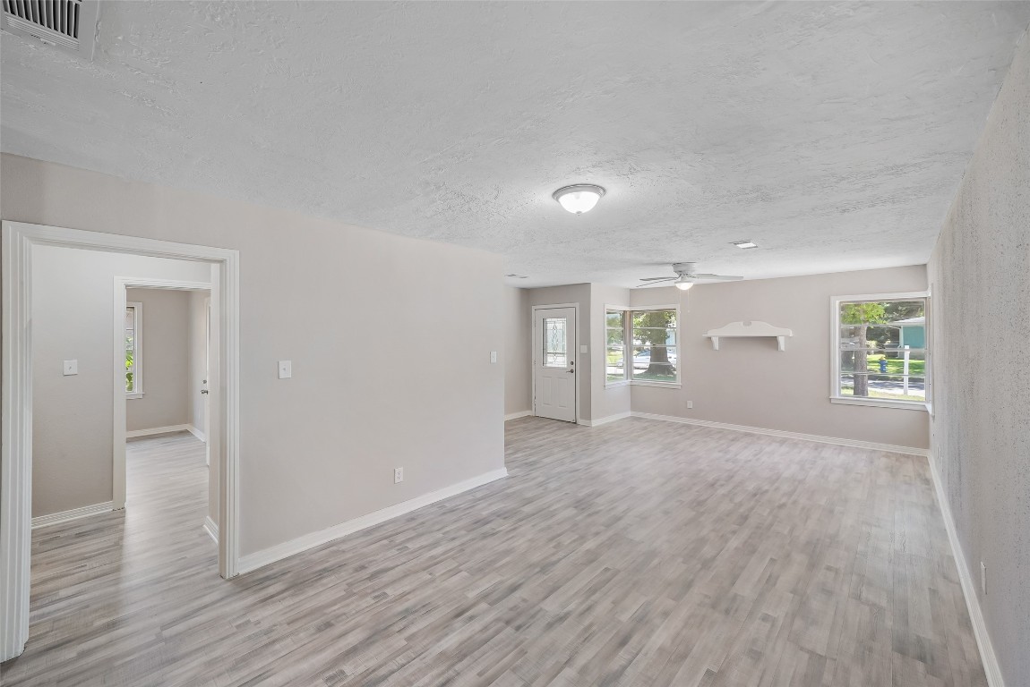 8527 Brower Street Houston, TX 77017 - Photo 6 of 19 wooden floor in an empty room and a window in a room