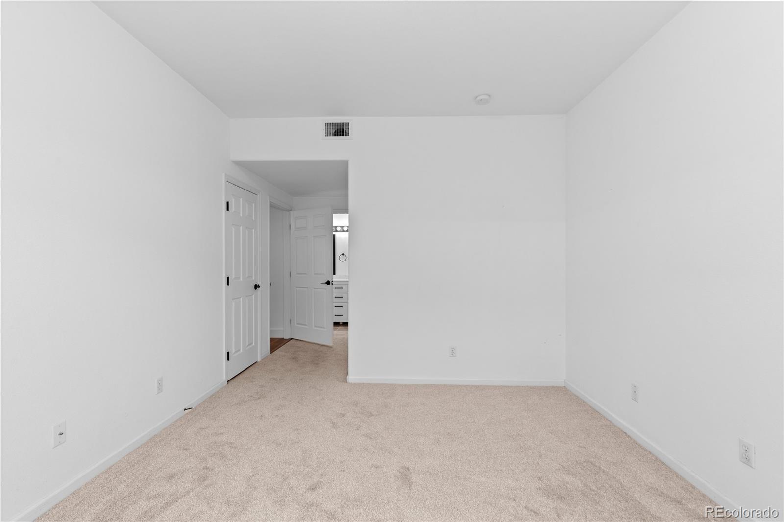 3855 East Canyon Ranch Road, Unit 104 Highlands Ranch, CO 80126 - Photo 28 of 36 a view of an empty room