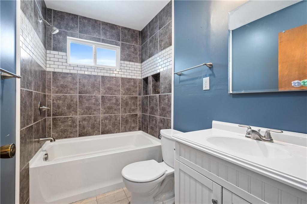 232 Naugle Road Beaver Falls, PA 15010 - Photo 15 of 26 Updated bathroom located on the main level.