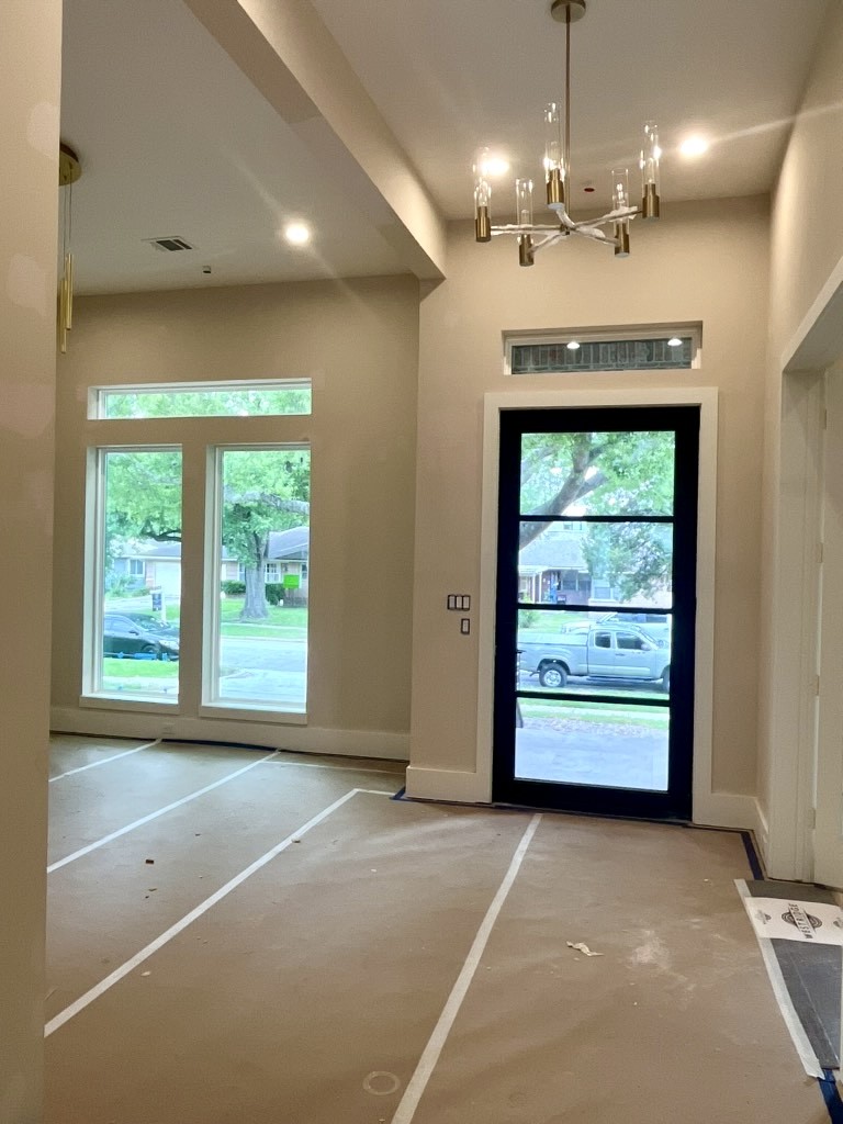 4623 Verone Street Bellaire, TX 77401 - Photo 2 of 8 a view of an empty room with a window
