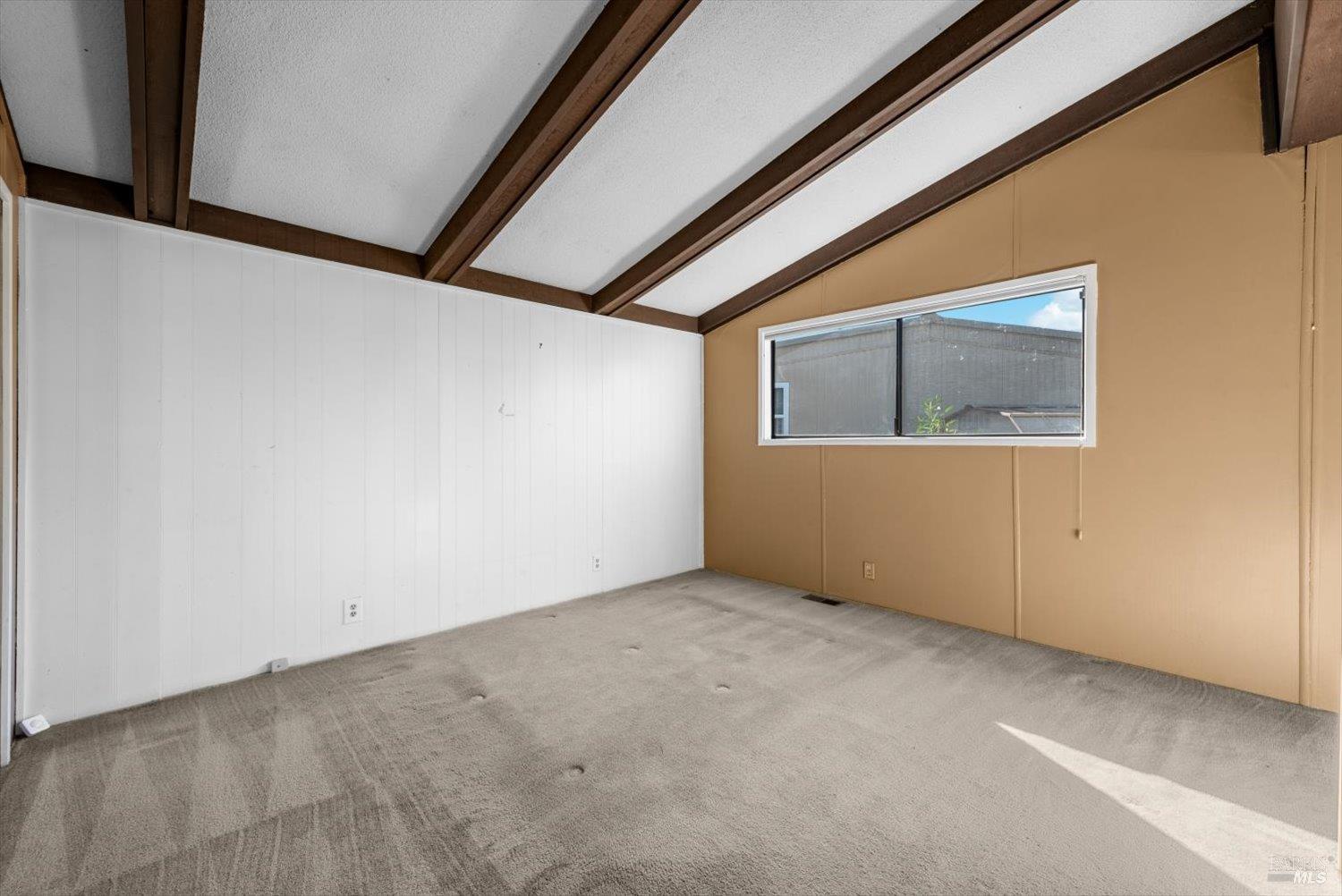 76 Lemon Tree Circle Vacaville, CA 95687 - Photo 25 of 30 a view of an empty room with a window