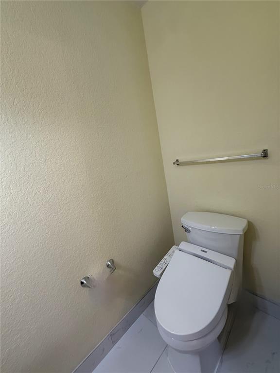 120 South Obrien Street Tampa, FL 33609 - Photo 11 of 47 close up of a toilet