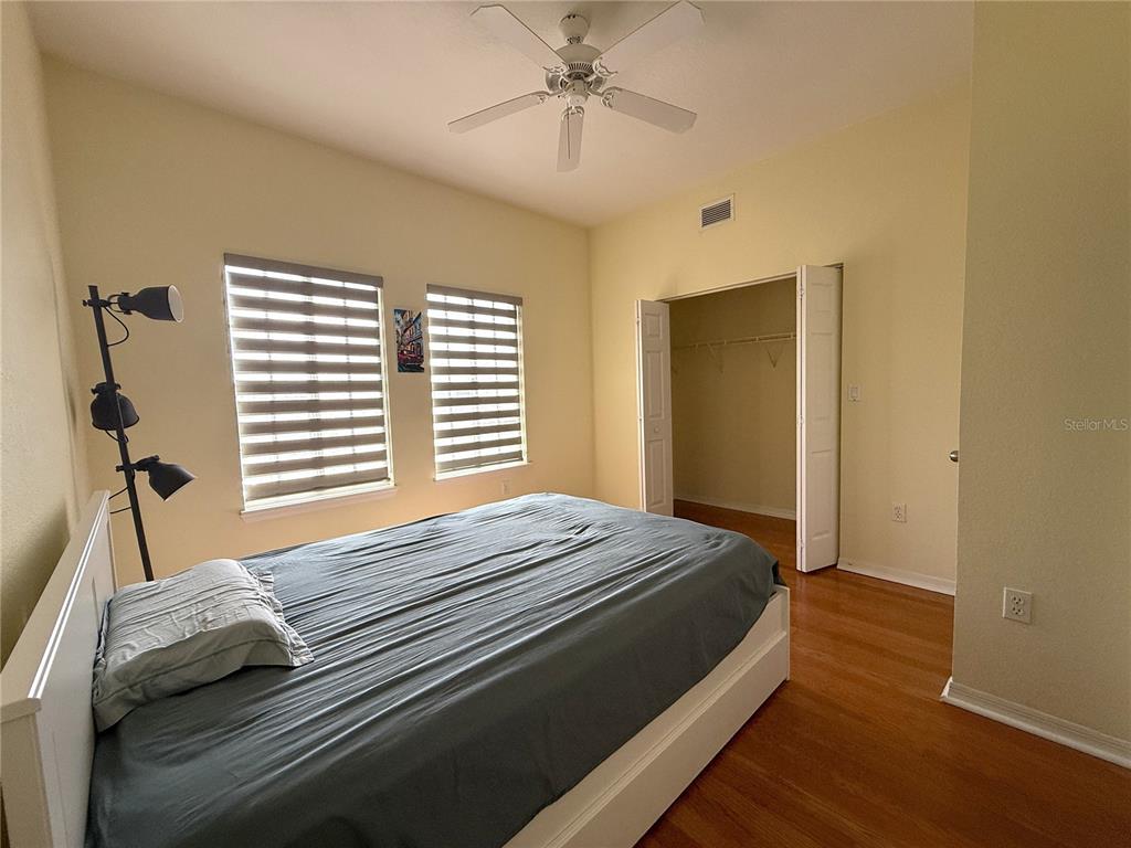 120 South Obrien Street Tampa, FL 33609 - Photo 16 of 47 a bedroom with a bed and a chandelier