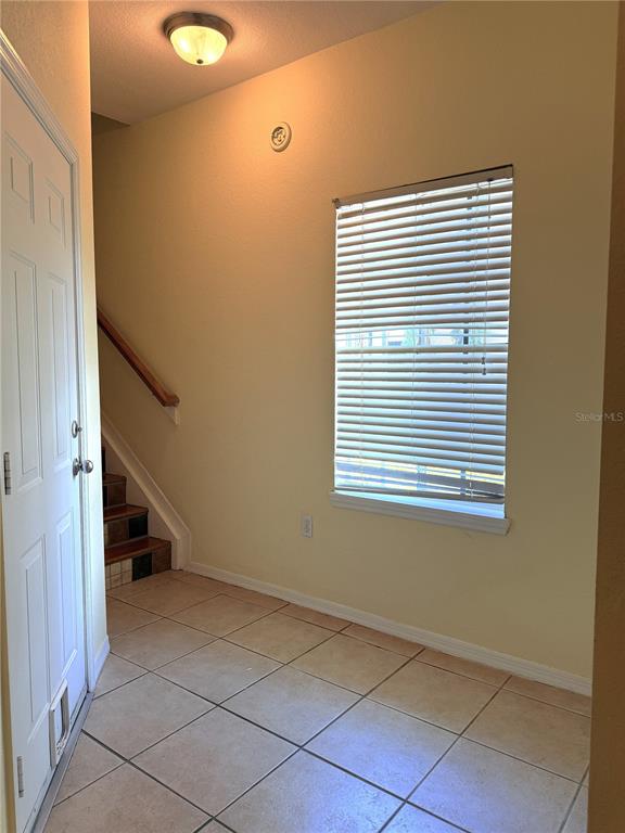 120 South Obrien Street Tampa, FL 33609 - Photo 27 of 47 a view of an empty room with stairs