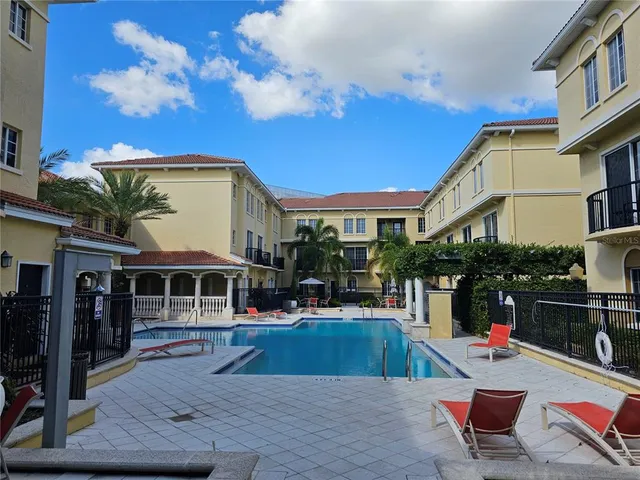 a view of a building with a swimming pool