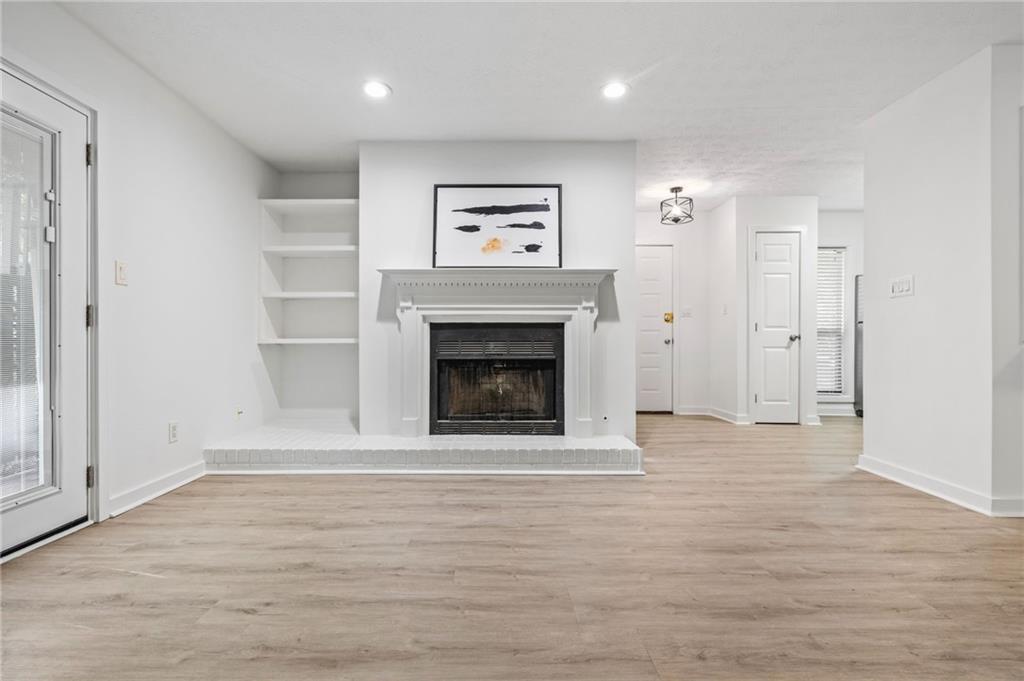 102 River Run Drive Atlanta, GA 30350 - Photo 14 of 28 a view of a livingroom with a fireplace