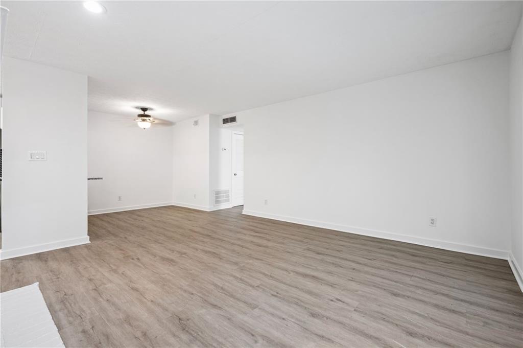 102 River Run Drive Atlanta, GA 30350 - Photo 15 of 28 a view of an empty room and wooden floor