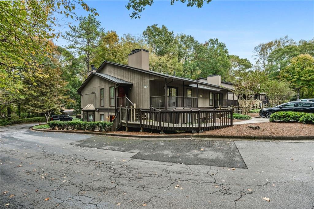 102 River Run Drive Atlanta, GA 30350 - Photo 3 of 28 a view of a house with a yard and potted plants