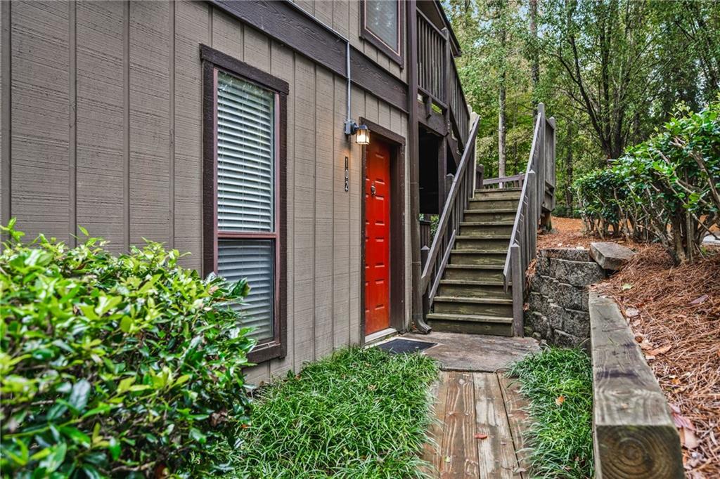 102 River Run Drive Atlanta, GA 30350 - Photo 5 of 28 a view of a house with a tree