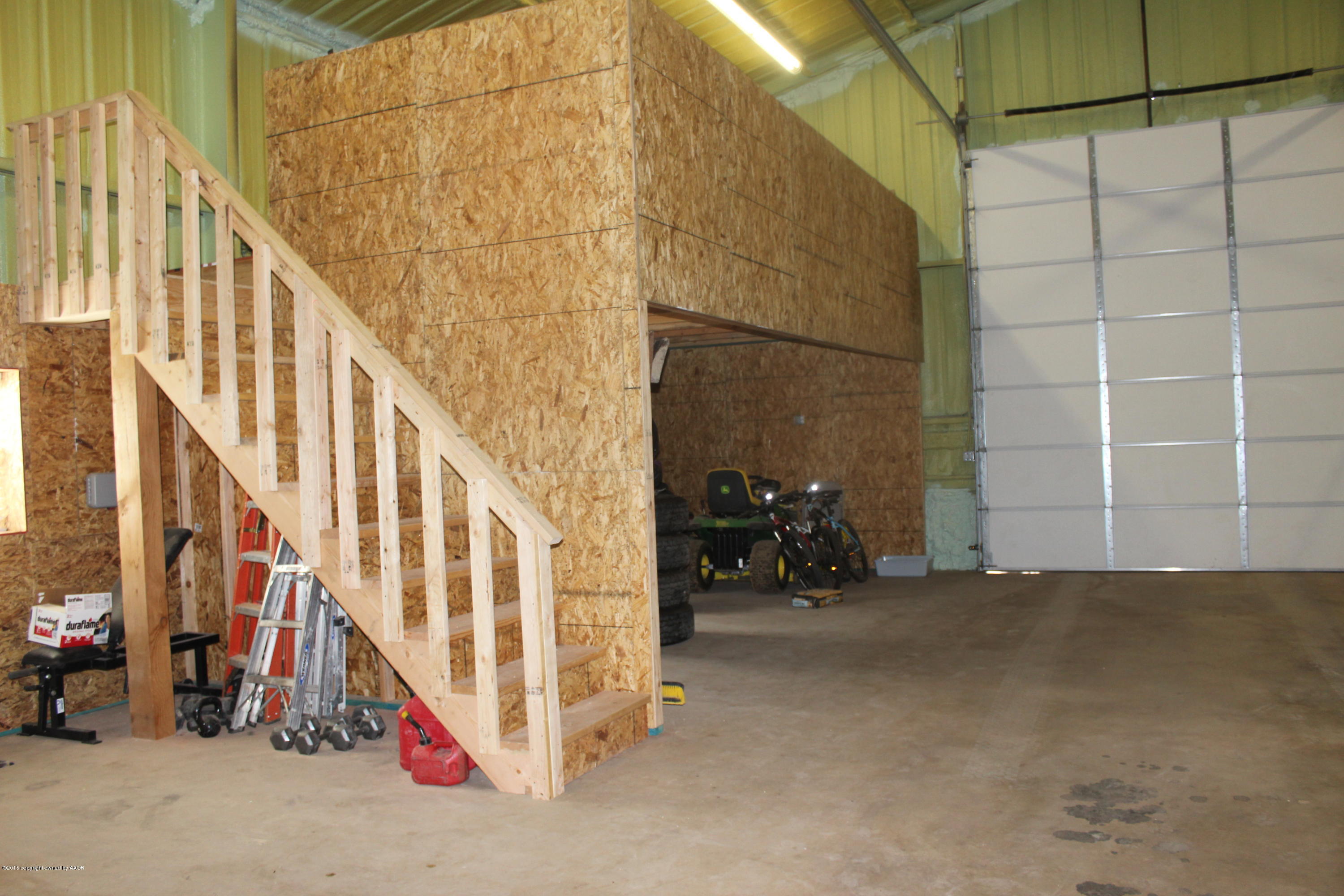 7450 Arnot Road Amarillo, TX 79119 - Photo 45 of 46 Garage / With Storage Loft