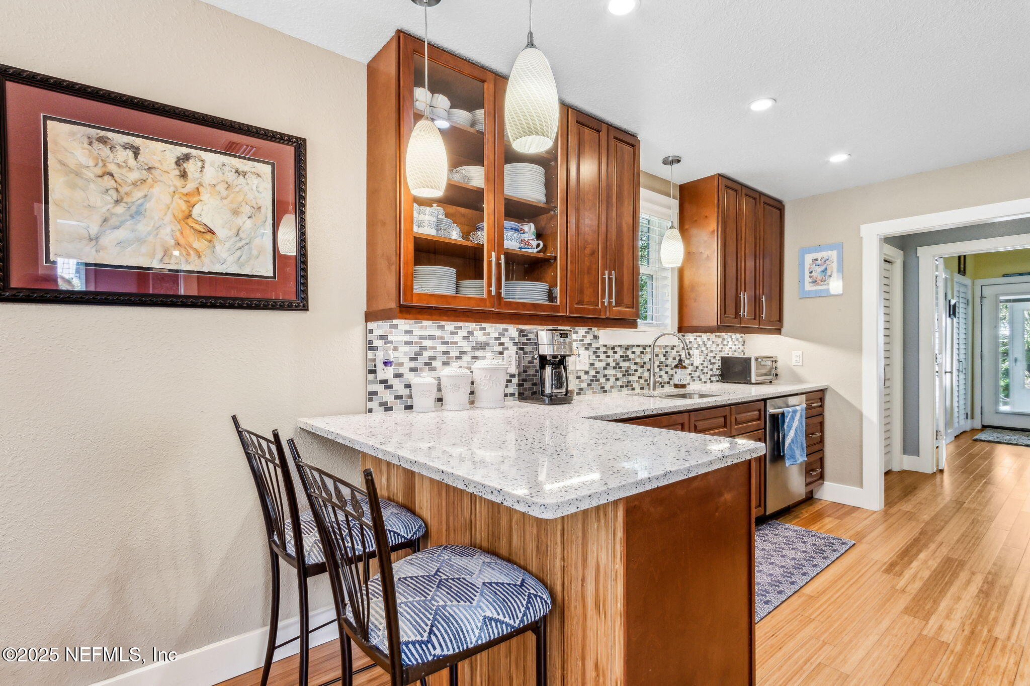 111 South 4th Street Fernandina Beach, FL 32034 - Photo 13 of 37 a view of a dining room with furniture and wooden floor