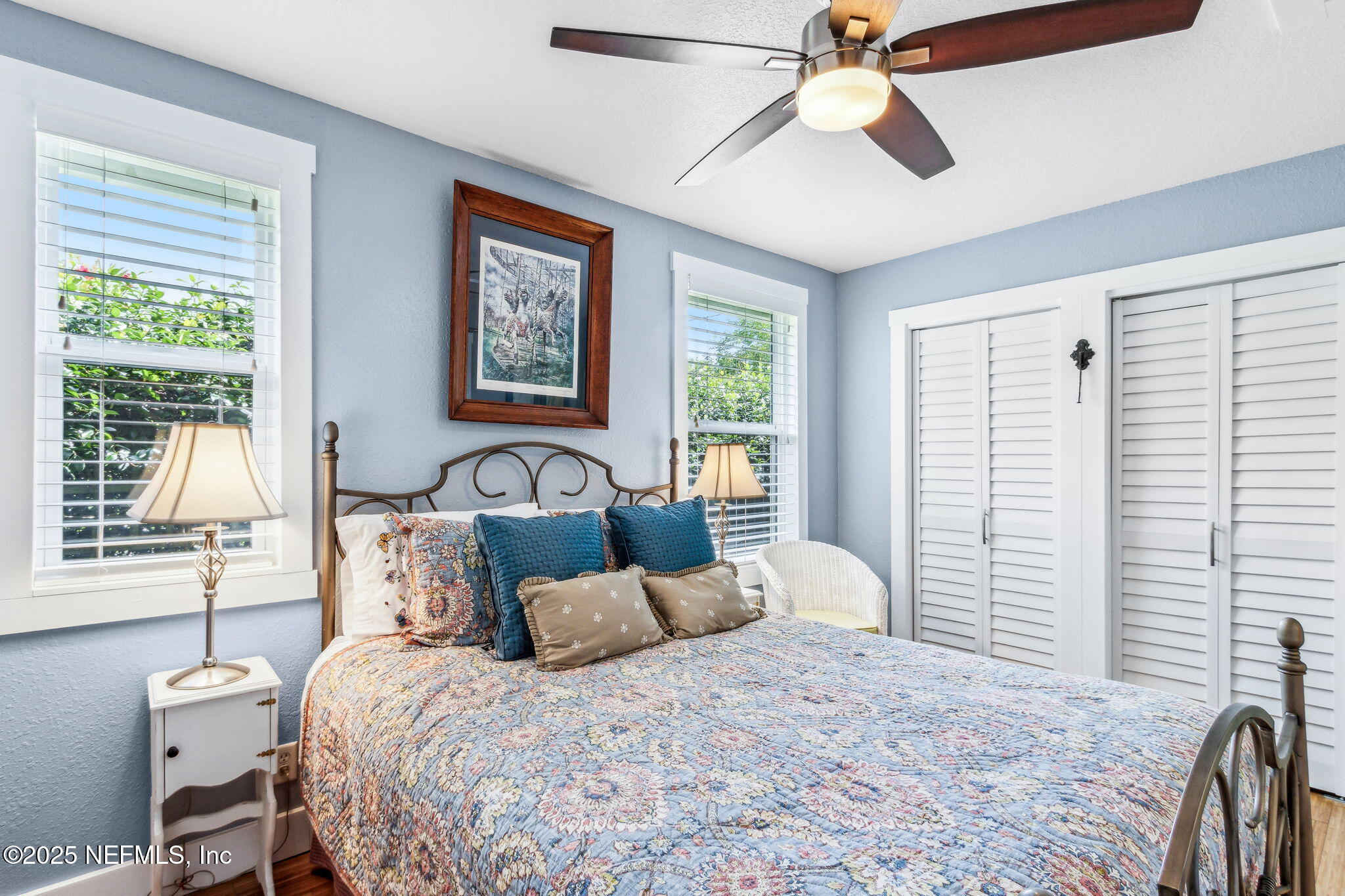 111 South 4th Street Fernandina Beach, FL 32034 - Photo 21 of 37 a bedroom with a large bed and a window