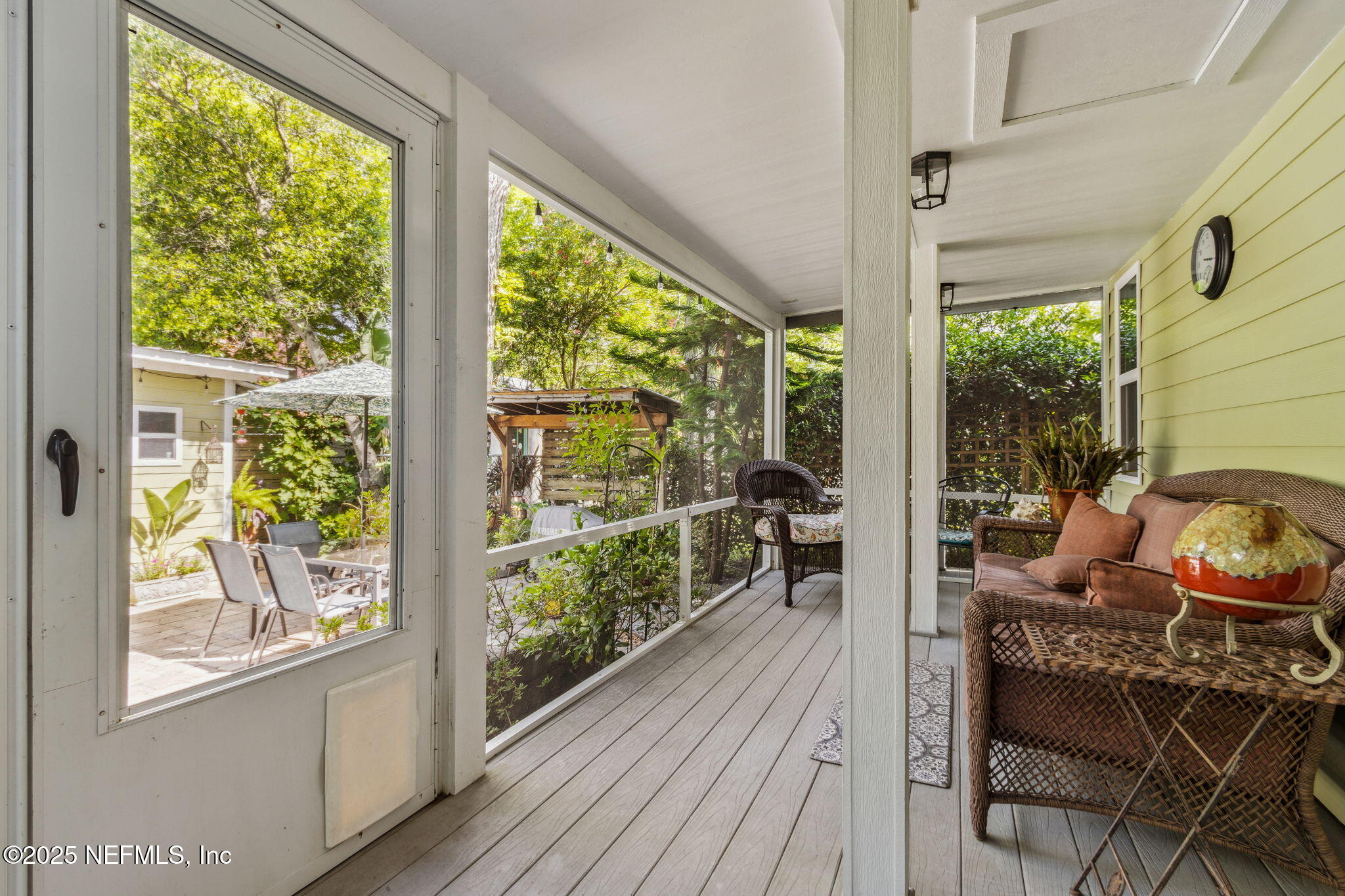 111 South 4th Street Fernandina Beach, FL 32034 - Photo 25 of 37 a balcony with furniture and wooden floor