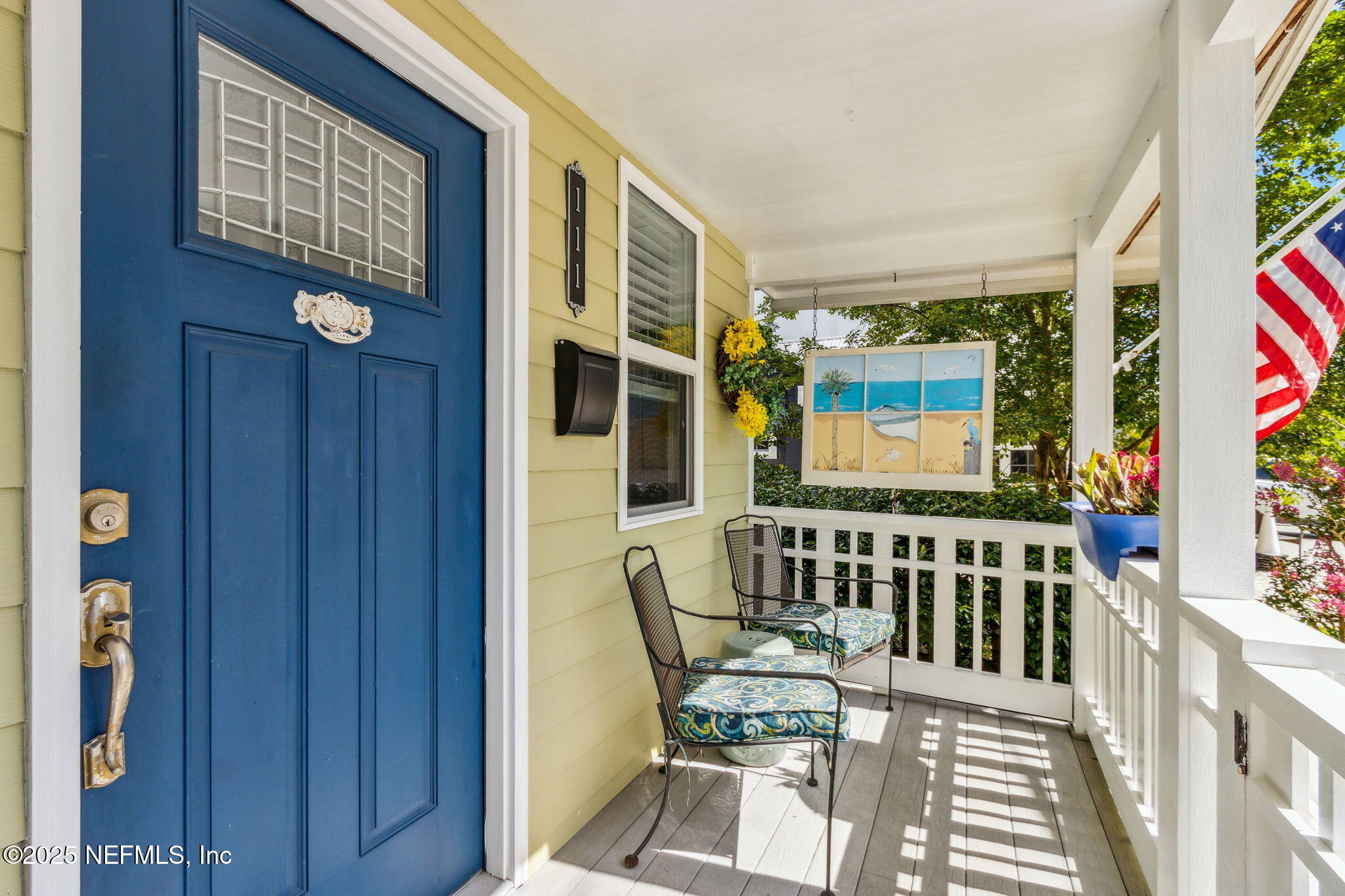 111 South 4th Street Fernandina Beach, FL 32034 - Photo 6 of 37 a view of a porch with furniture and wooden floor