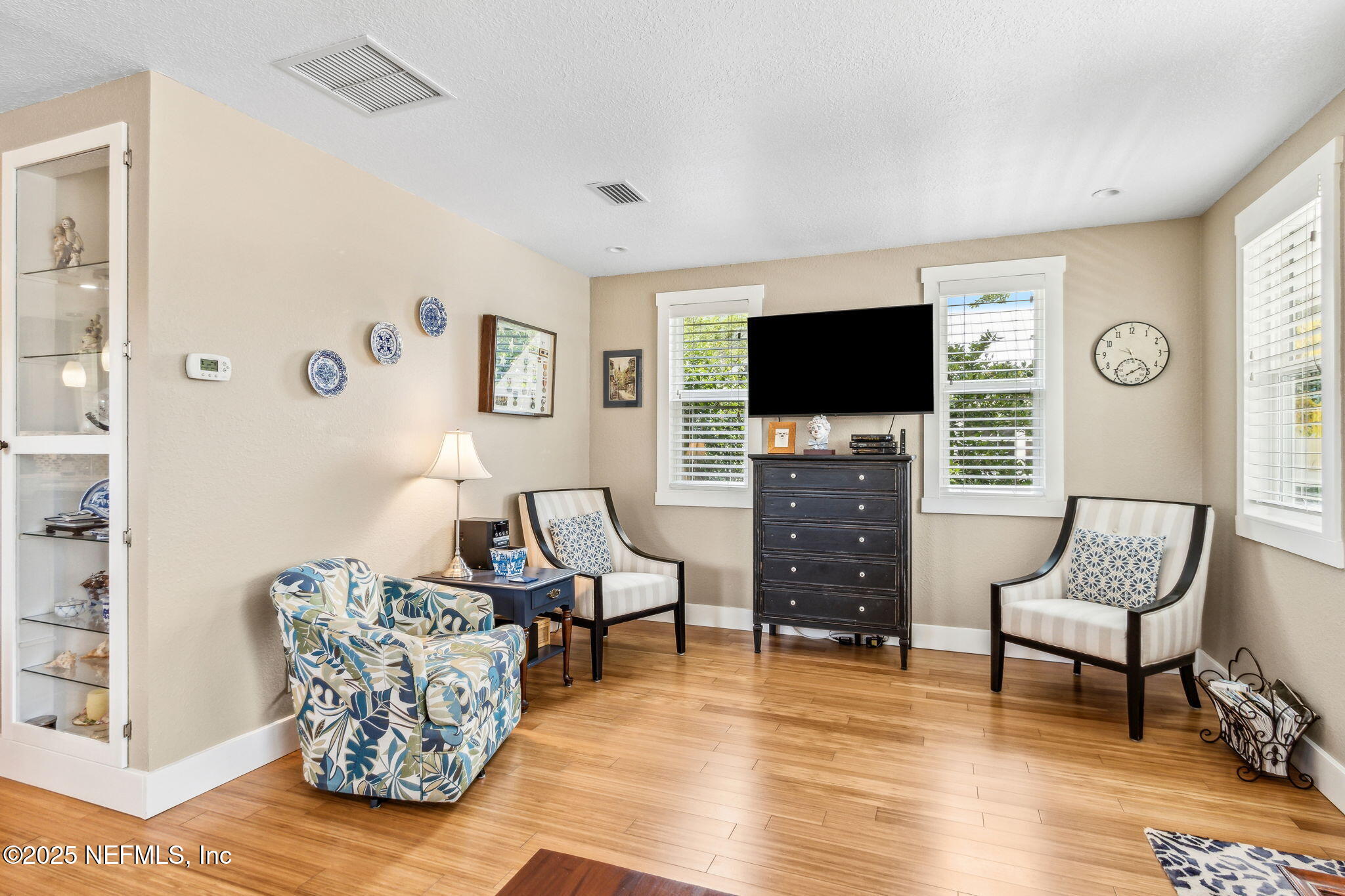 111 South 4th Street Fernandina Beach, FL 32034 - Photo 10 of 37 a living room with furniture and a flat screen tv