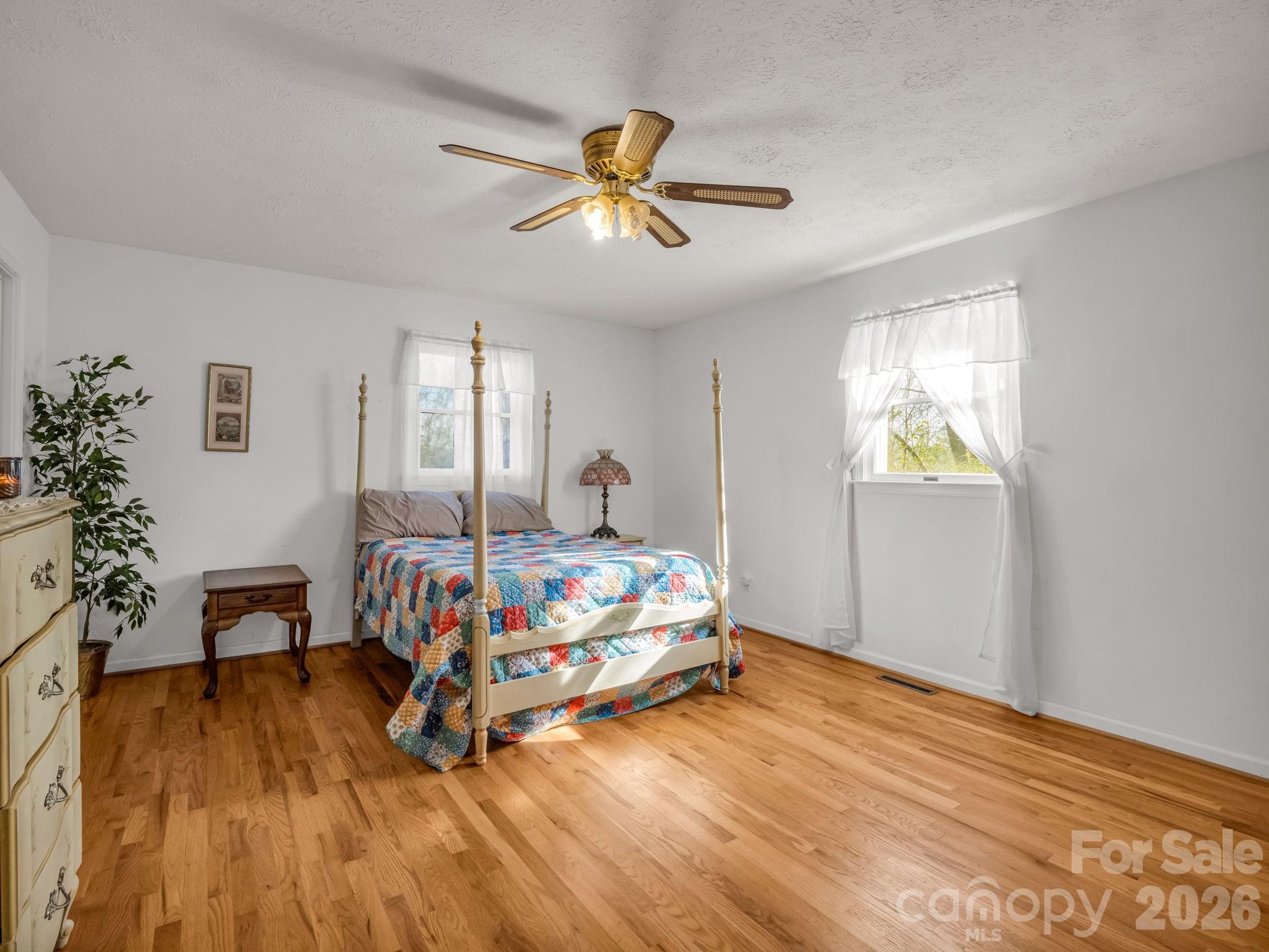 755 Mt Olivet Road Zirconia, NC 28790 - Photo 13 of 35 a bedroom with bed and window