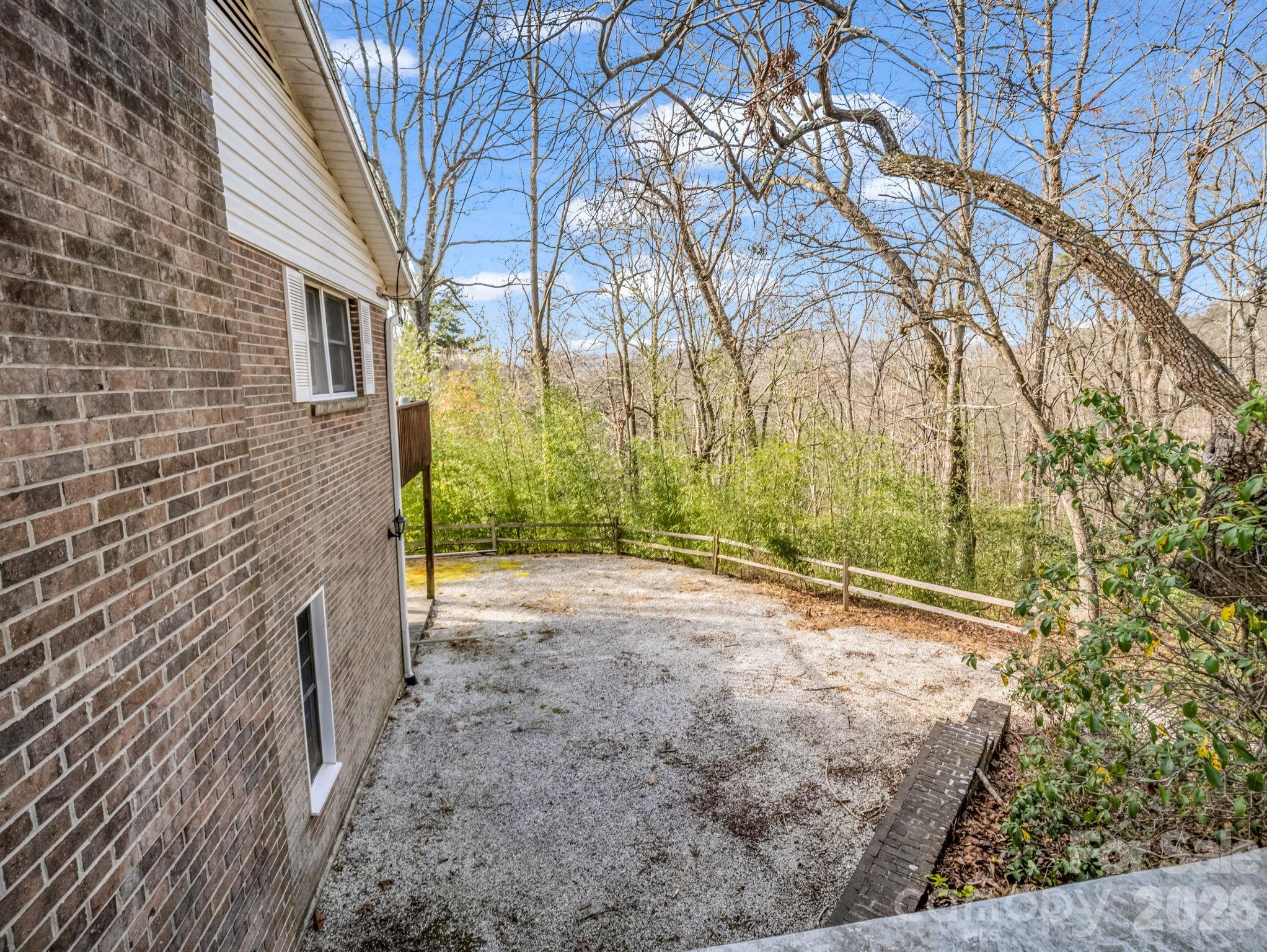 755 Mt Olivet Road Zirconia, NC 28790 - Photo 26 of 35 a view of a backyard of the house