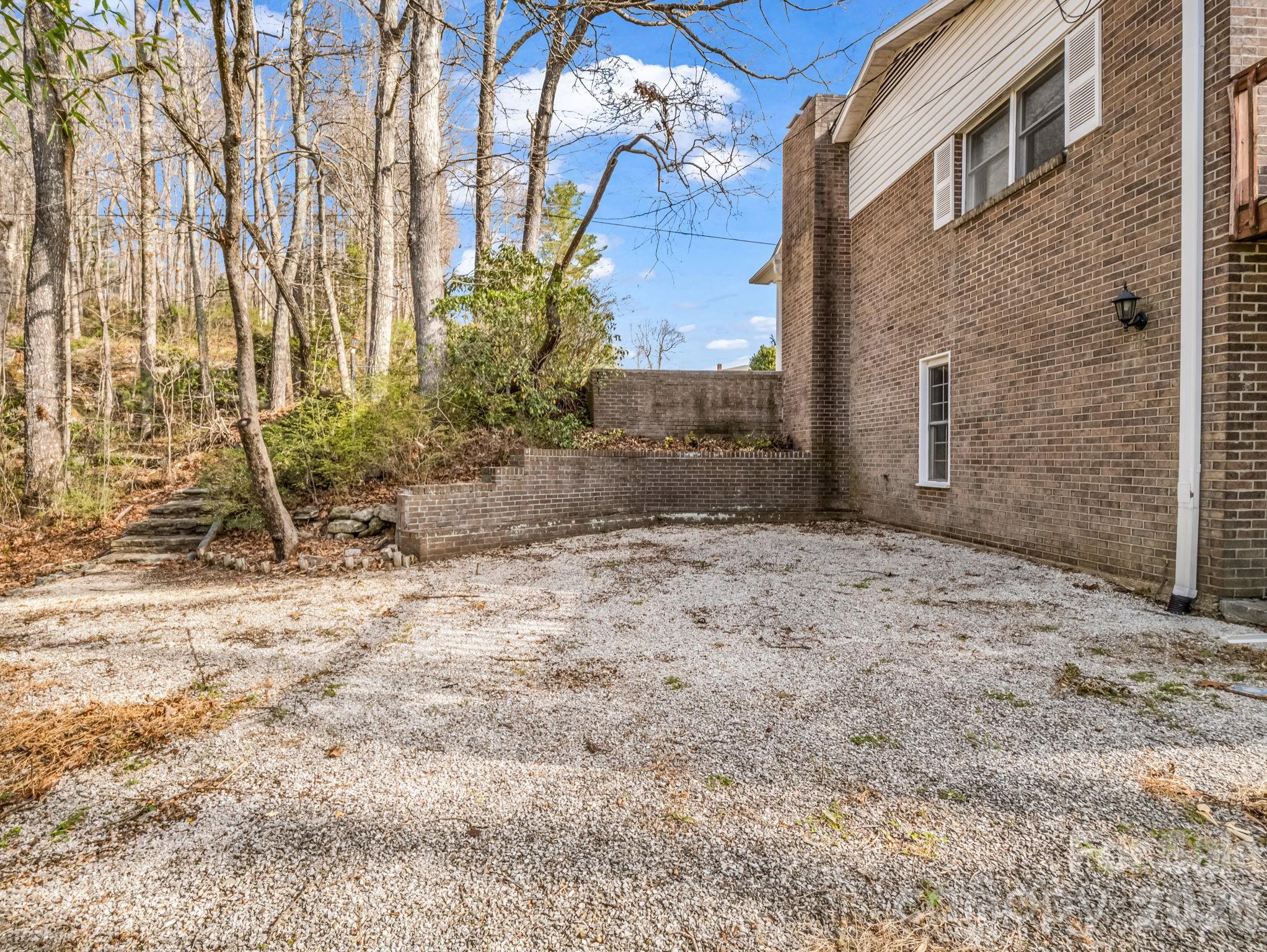 755 Mt Olivet Road Zirconia, NC 28790 - Photo 27 of 35 a view of a backyard of the house