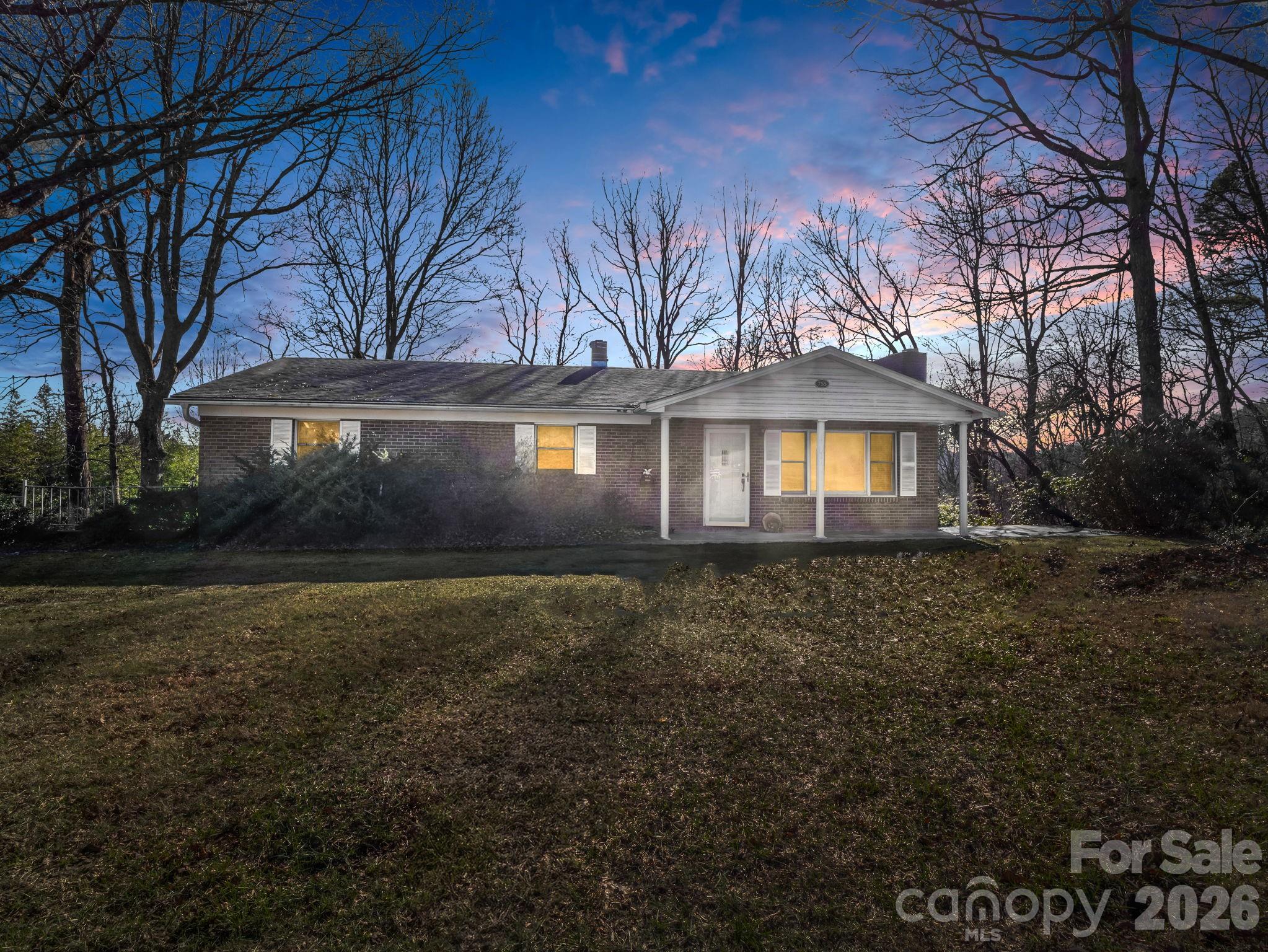 755 Mt Olivet Road Zirconia, NC 28790 - Photo 35 of 35 a front view of a house with garden
