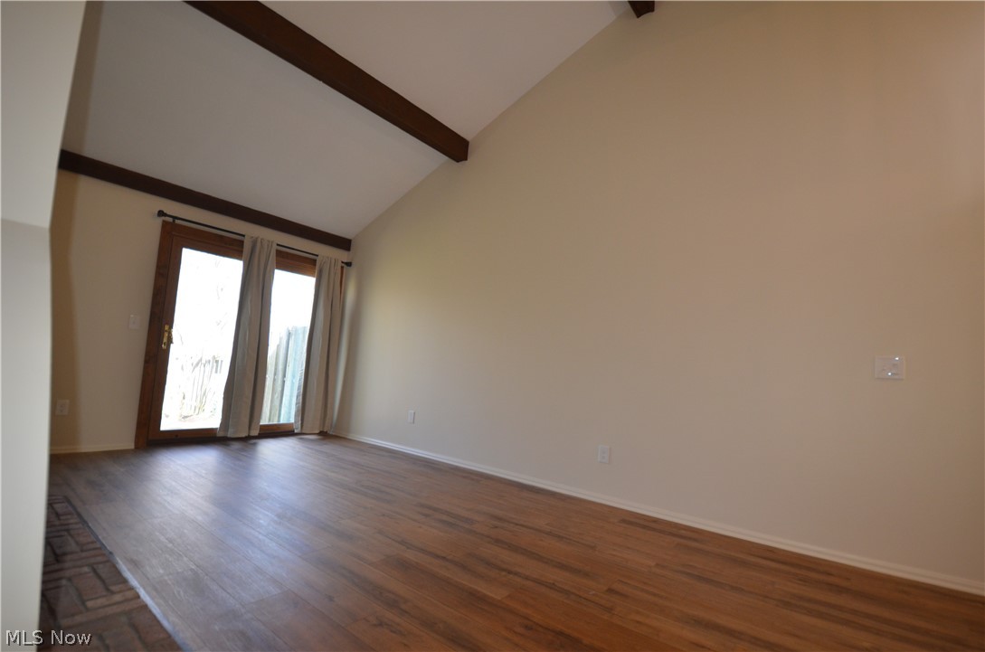 6933 West Fitzwater Road Brecksville, OH 44141 - Photo 5 of 18 Another angle of the living room, showing the patio door to the rear.
