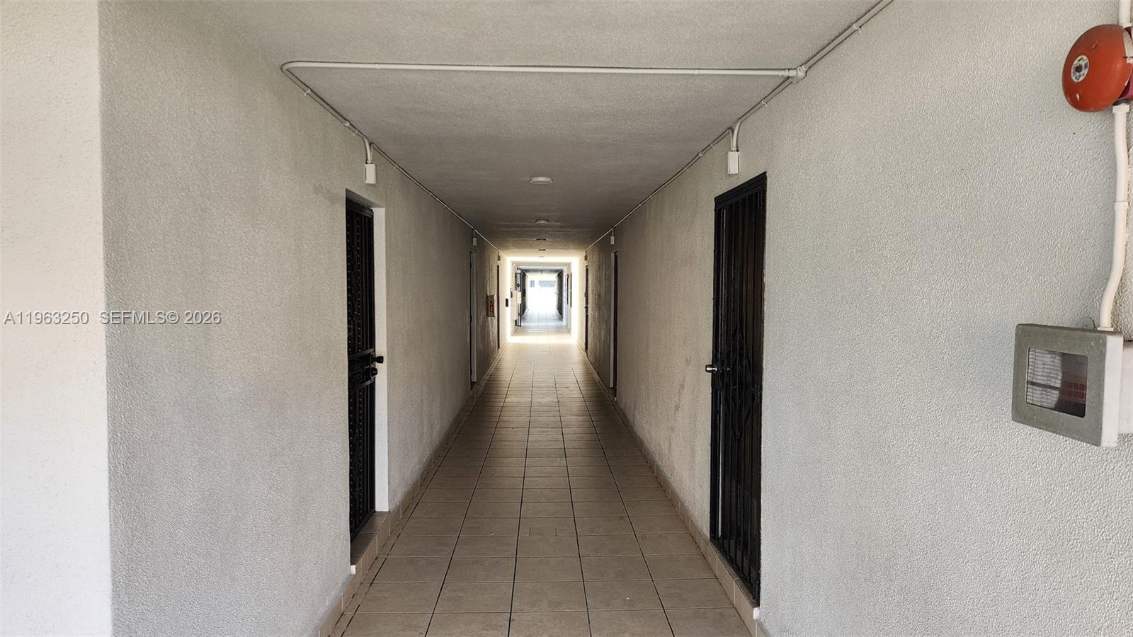 9000 Southwest 24th Street, Unit 14C Miami, FL 33165 - Photo 19 of 27 Hallway to Unit