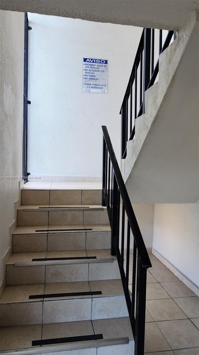 9000 Southwest 24th Street, Unit 14C Miami, FL 33165 - Photo 20 of 27 2 Story Bldg Stairwell