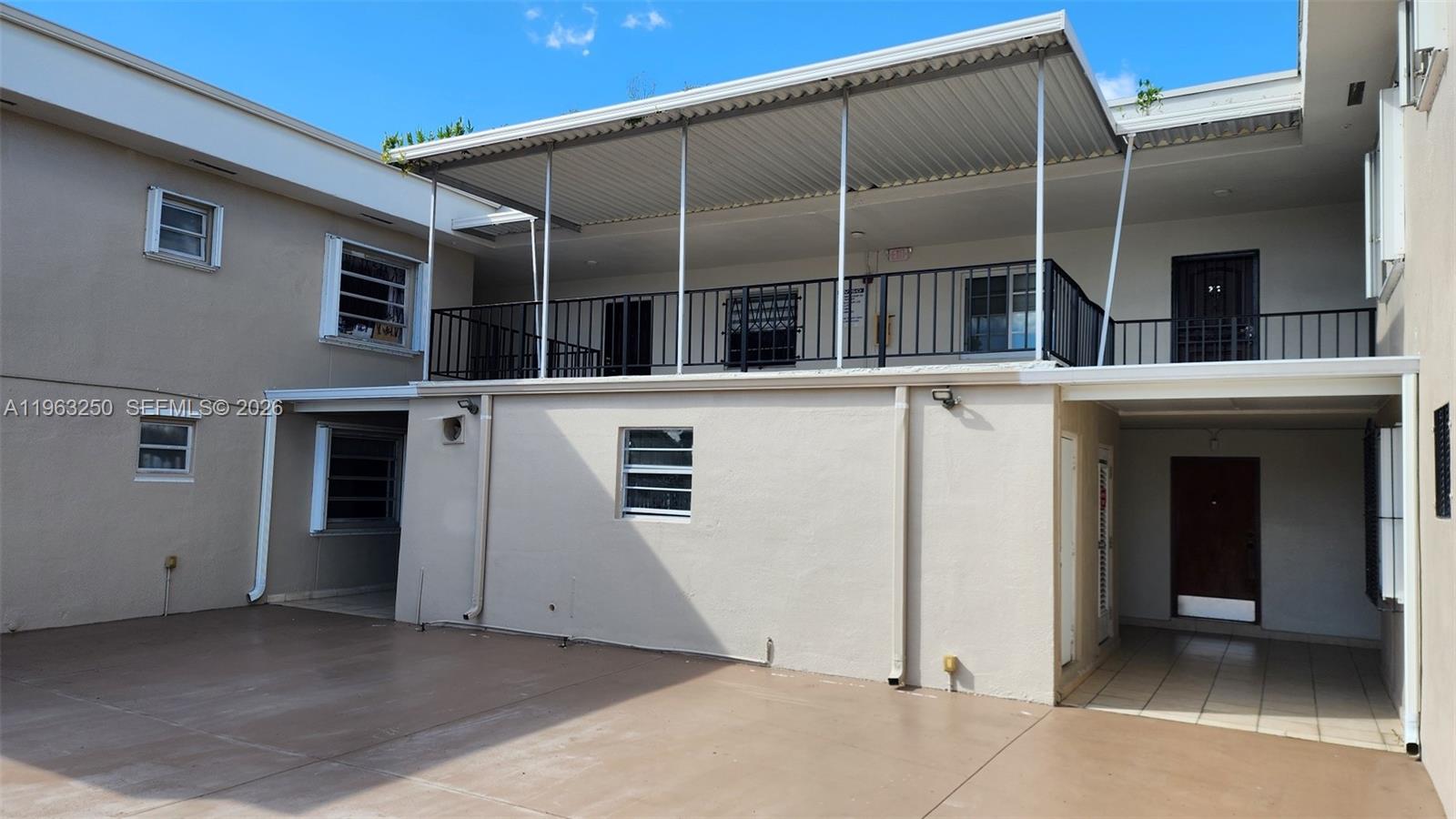 9000 Southwest 24th Street, Unit 14C Miami, FL 33165 - Photo 23 of 27 Center courtyard entry