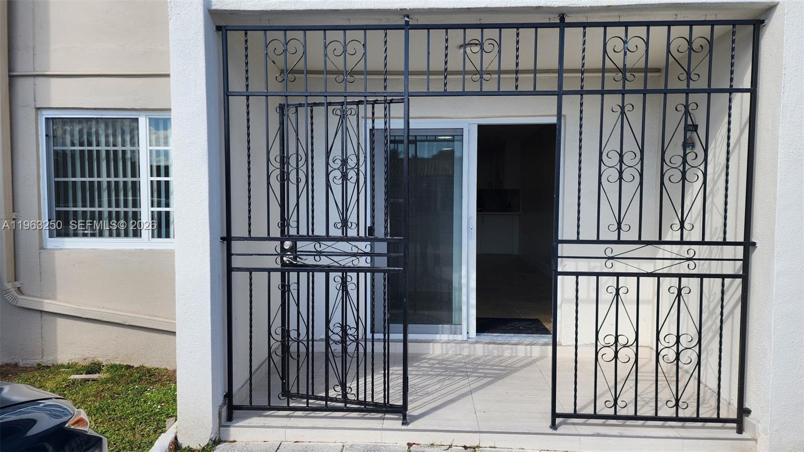 9000 Southwest 24th Street, Unit 14C Miami, FL 33165 - Photo 25 of 27 Balcony entrance to unit