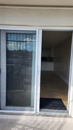 a car parked in front of a house