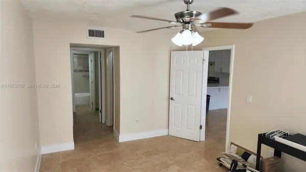 a view of an entryway with a chandelier