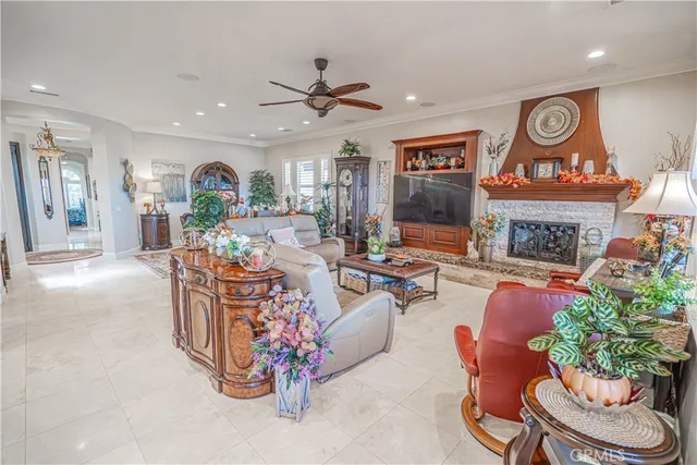 a view of a dining room with furniture wooden floor and chandelier
