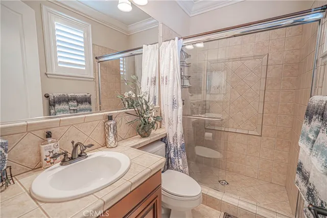 a bed room with a bed and a fireplace