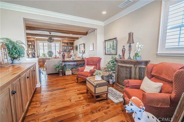 a building outdoor space with patio furniture and potted plants