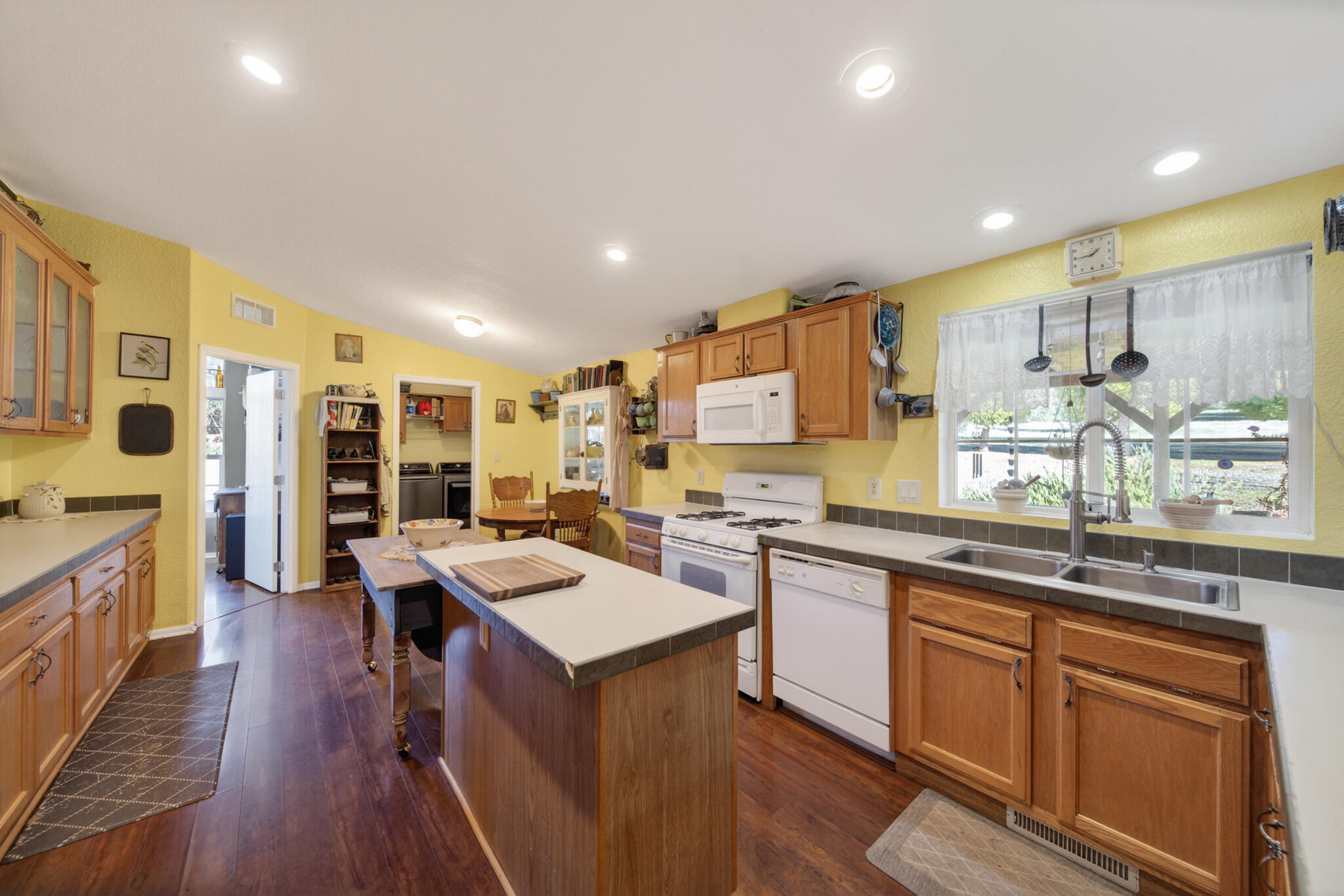 32017 Rock Creek Road Manton, CA 96059 - Photo 12 of 57 a open kitchen with stainless steel appliances granite countertop a lot of counter space and wooden floors