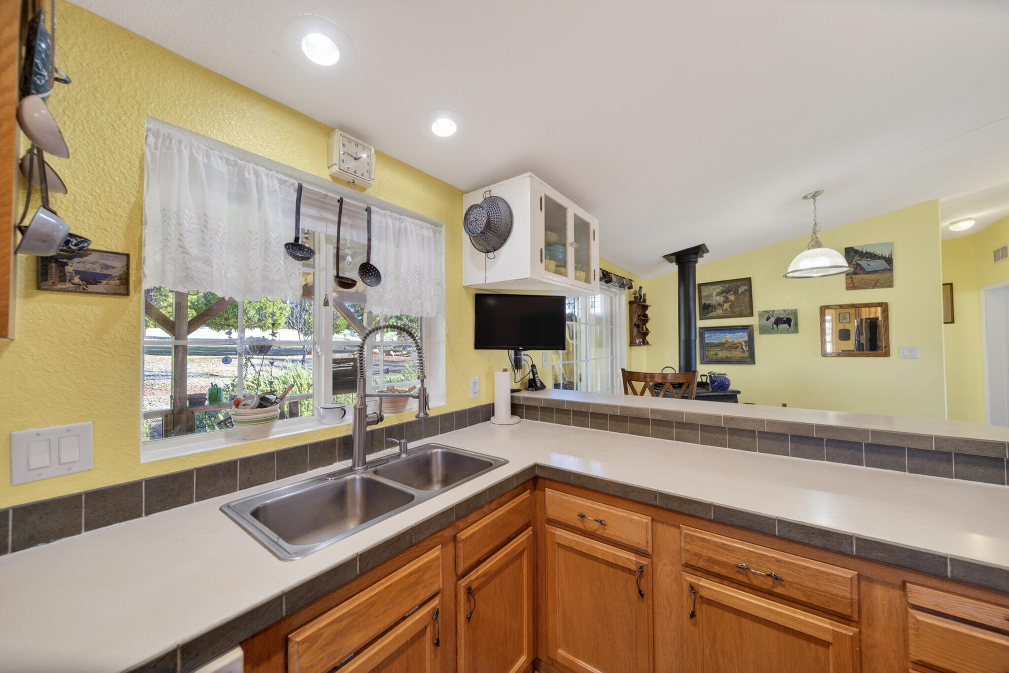 32017 Rock Creek Road Manton, CA 96059 - Photo 14 of 57 a kitchen with stainless steel appliances a sink and a microwave