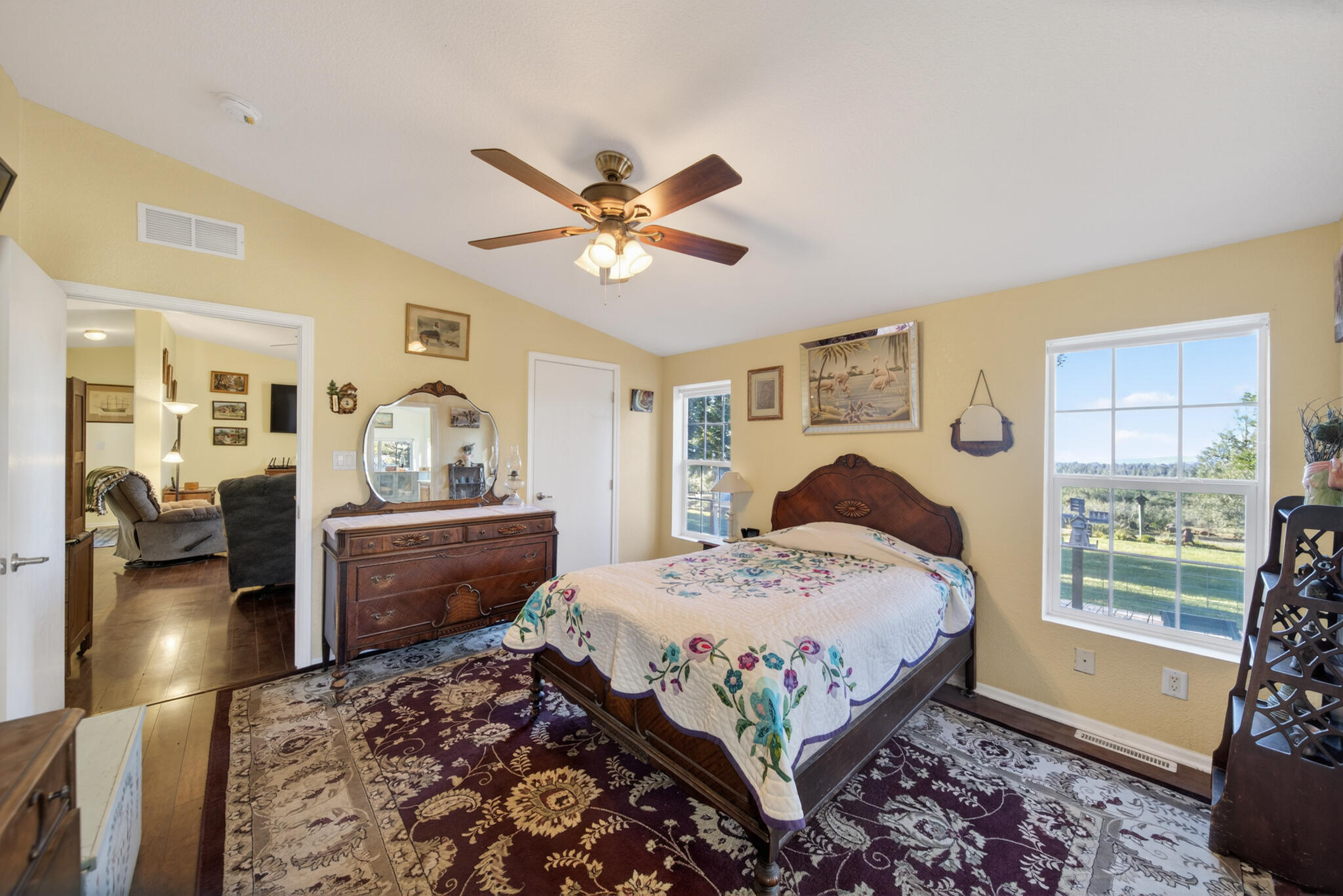 32017 Rock Creek Road Manton, CA 96059 - Photo 16 of 57 a bedroom with a bed couch and a window