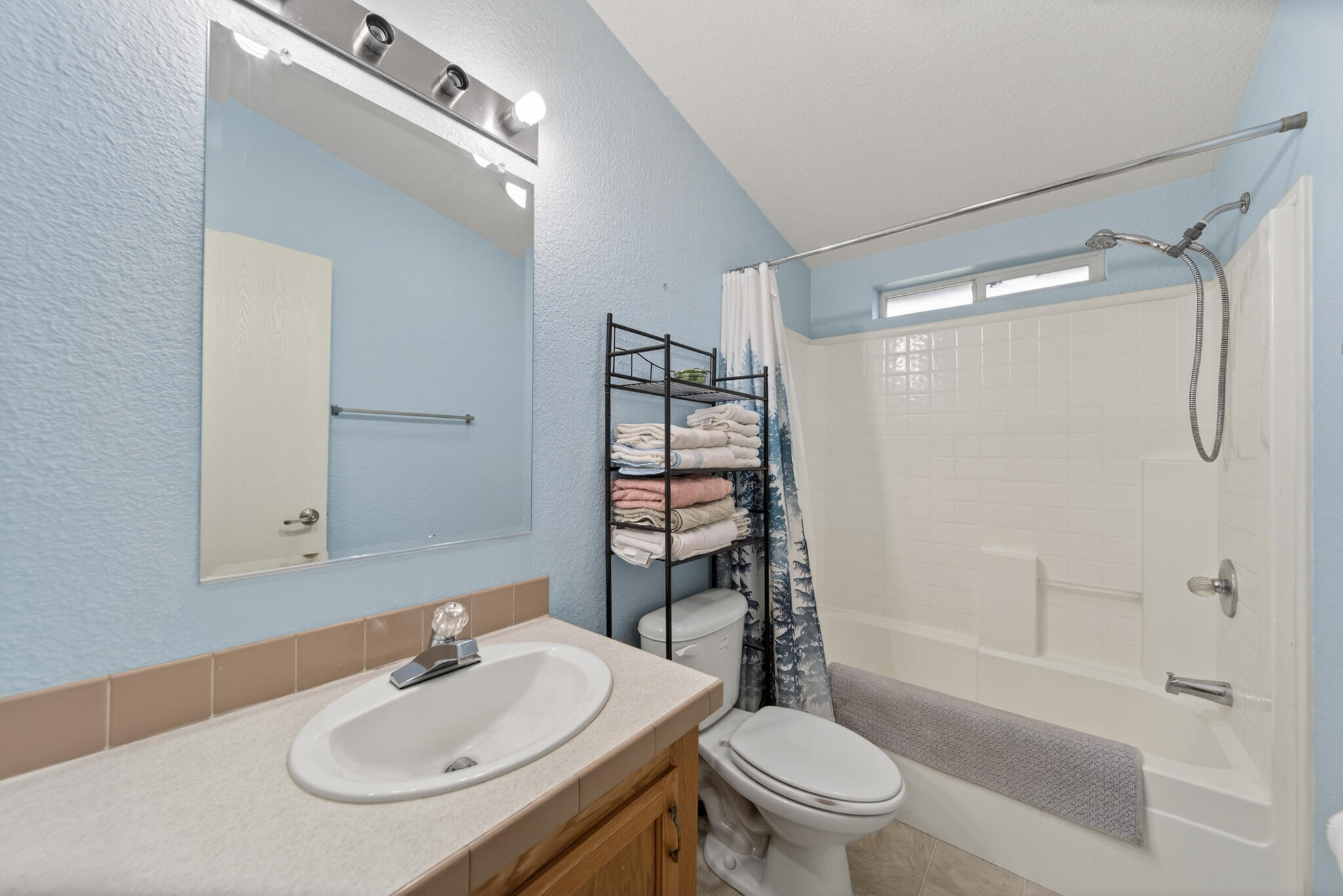 32017 Rock Creek Road Manton, CA 96059 - Photo 22 of 57 a bathroom with a sink toilet and shower