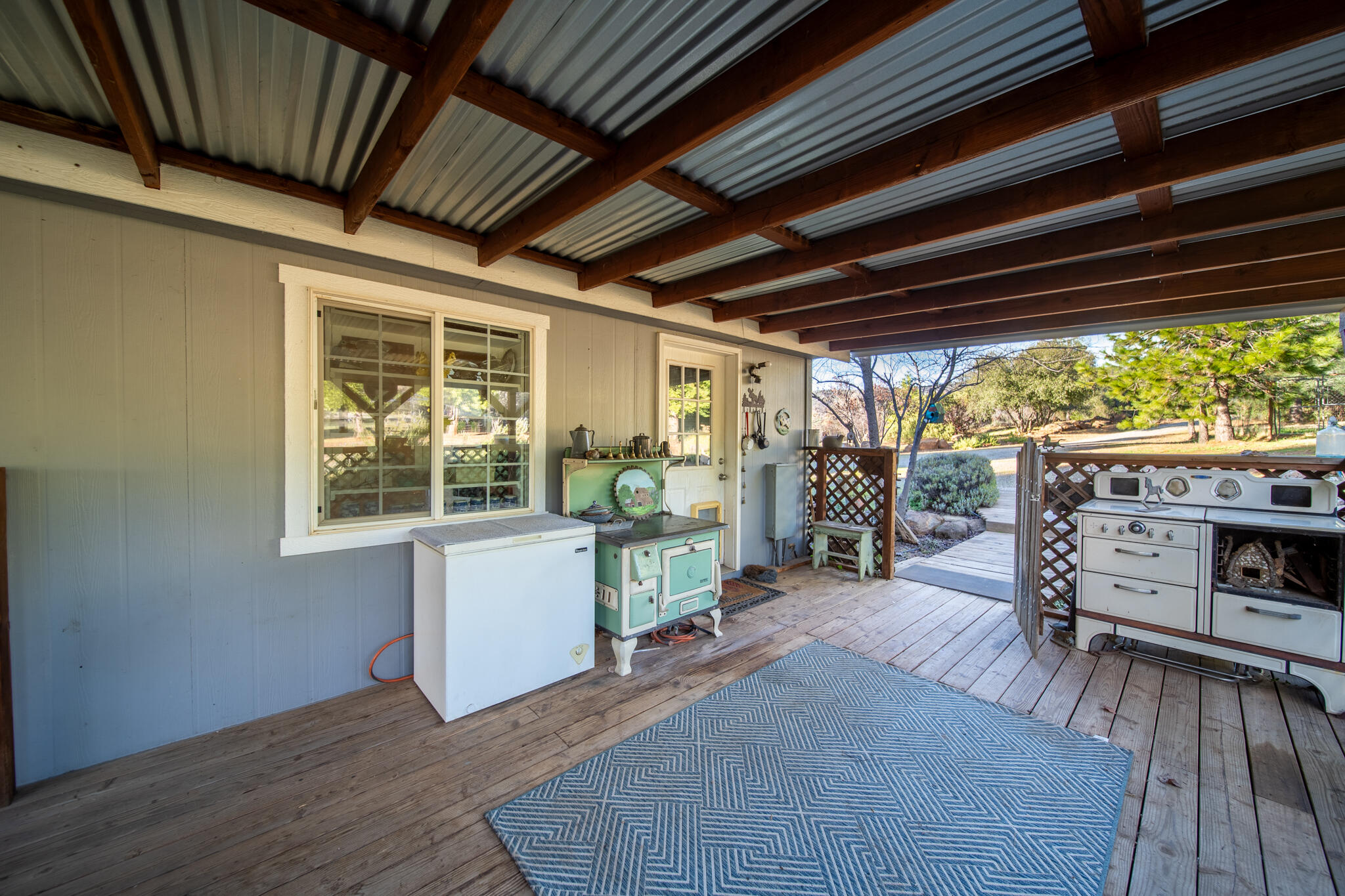 32017 Rock Creek Road Manton, CA 96059 - Photo 39 of 57 a view of a room with wooden floors and furniture