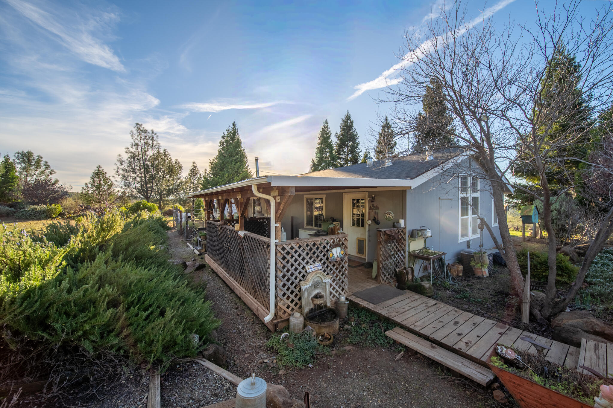 32017 Rock Creek Road Manton, CA 96059 - Photo 41 of 57 a front view of house with a garden
