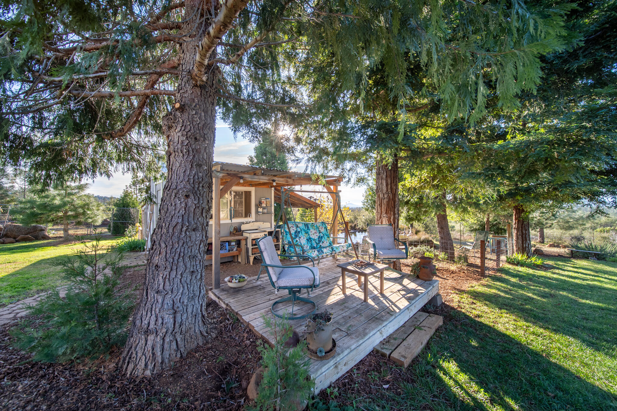 32017 Rock Creek Road Manton, CA 96059 - Photo 46 of 57 a view of a backyard with sitting area