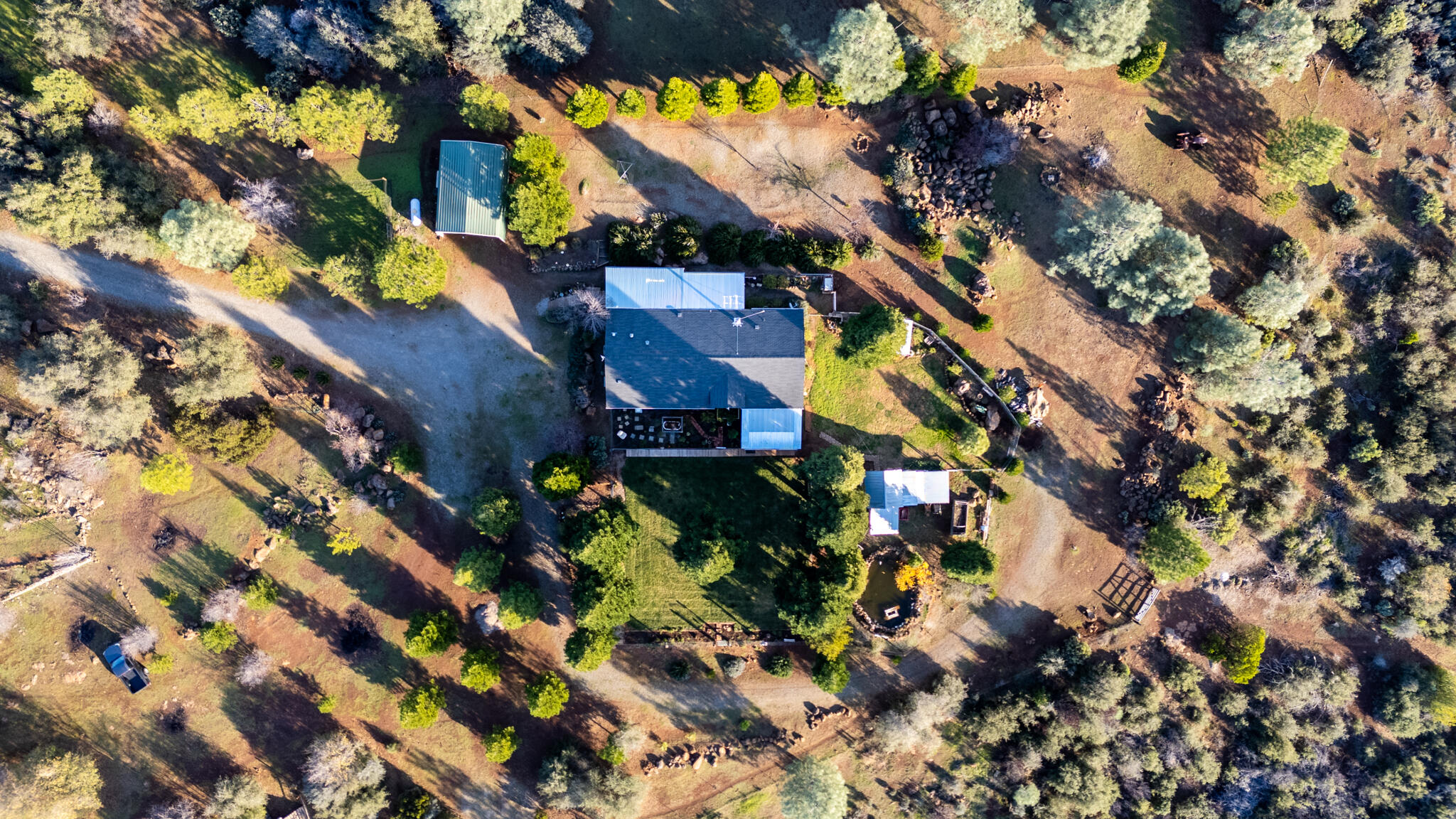 32017 Rock Creek Road Manton, CA 96059 - Photo 49 of 57 an aerial view of a house with a yard