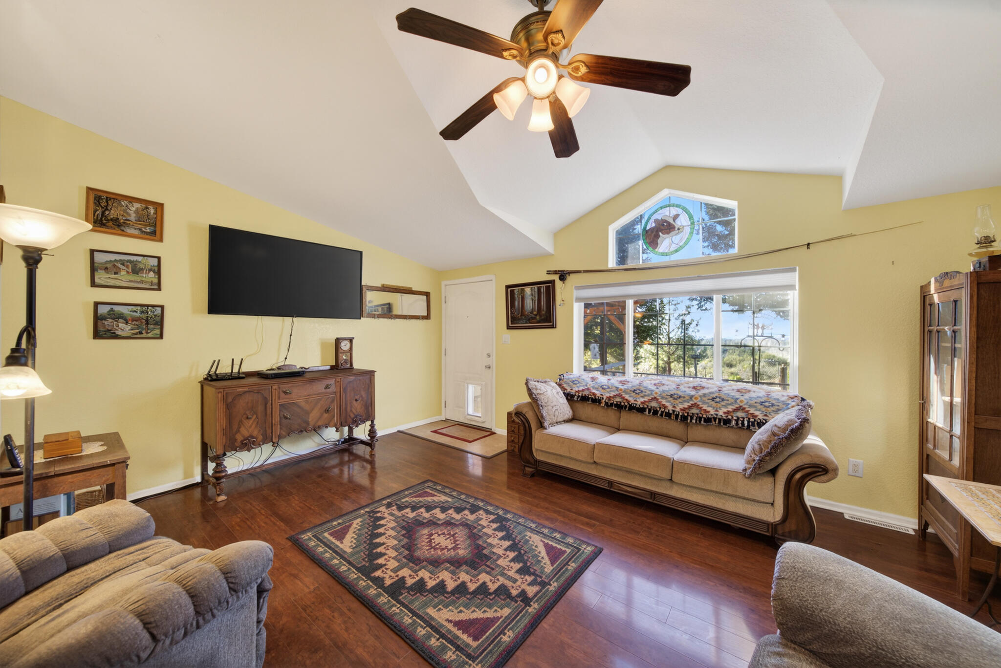 32017 Rock Creek Road Manton, CA 96059 - Photo 9 of 57 a living room with furniture and a flat screen tv