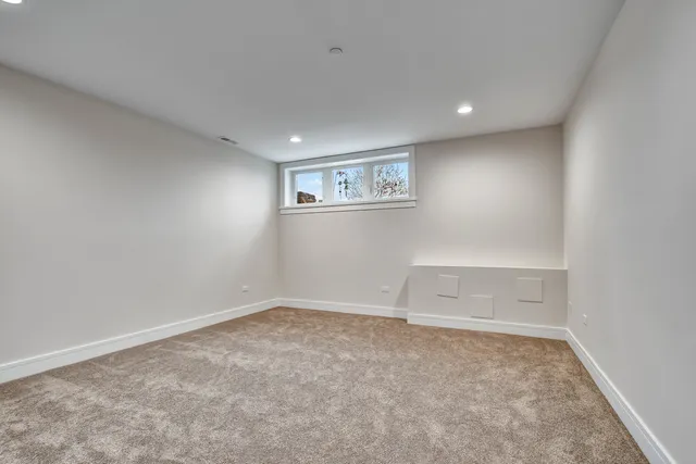 an empty room with shelves