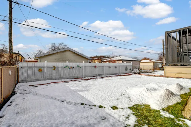 a view of swimming pool with a lounge chairs