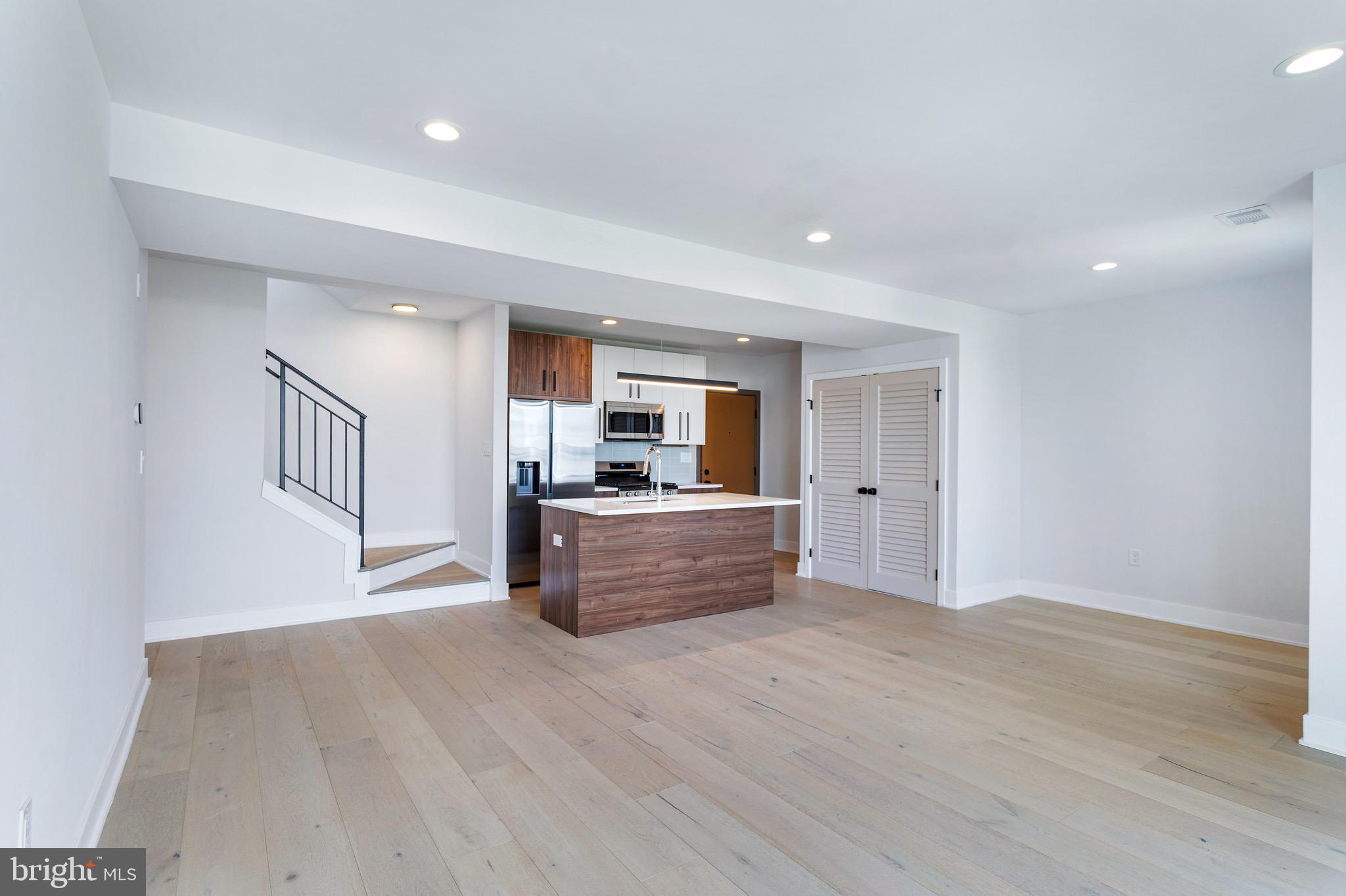 845 19th Street Northeast, Unit PH12 Washington, DC 20002 - Photo 6 of 24 a view of kitchen with wooden floor