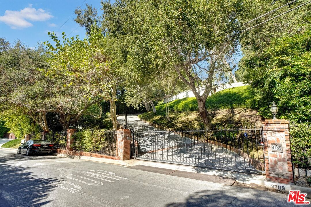 9789 Oak Pass Road Beverly Hills, CA 90210 - Photo 1 of 1 a view of a street