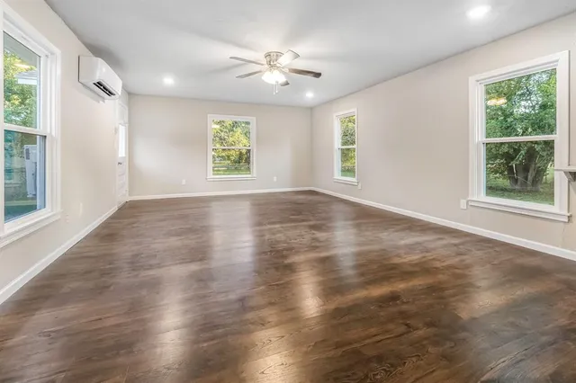 a bathroom with a sink a vanity and a mirror