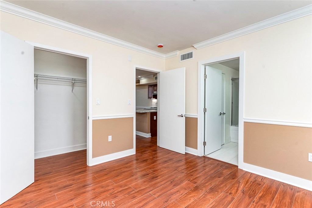 596 South Brea Boulevard Brea, CA 92821 - Photo 14 of 33 a view of empty room with wooden floor