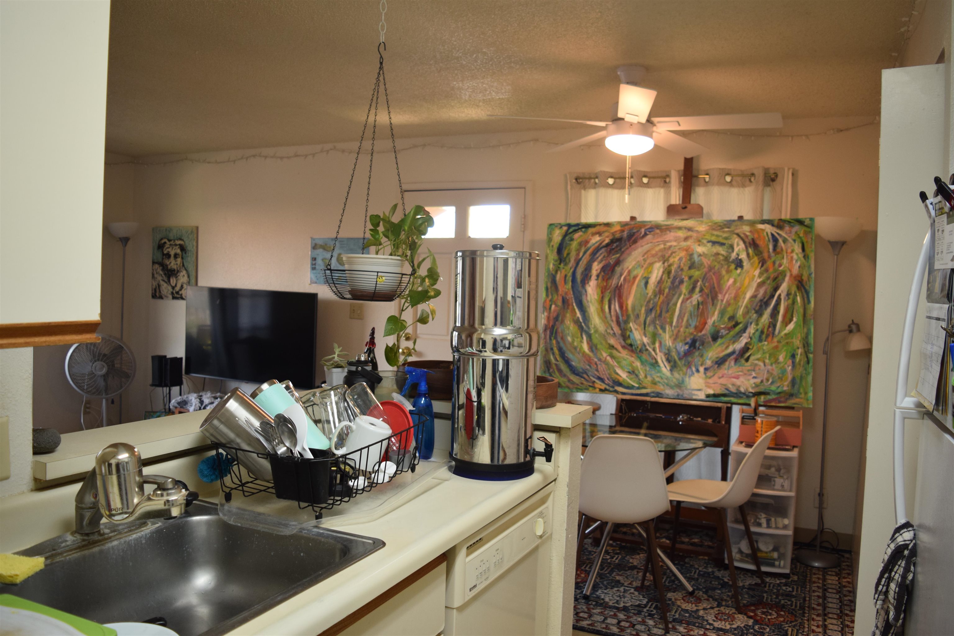140 Uwapo Road, Unit 41203 Kihei, HI 96753 - Photo 5 of 17 a kitchen with a sink and cabinets